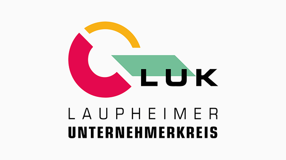 Logo des Laupheimer Unternehmerkreises mit den Initialen „LUK“ in modernem Design mit roten, gelben und grünen grafischen Elementen.